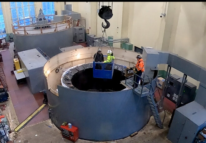 Crew lowered into the generator cavity.