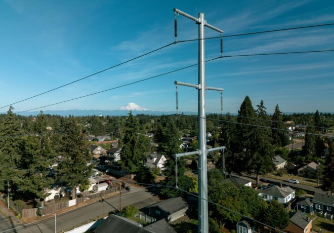 High voltage transmission line over Tacoma with Mt. Rainer in the background