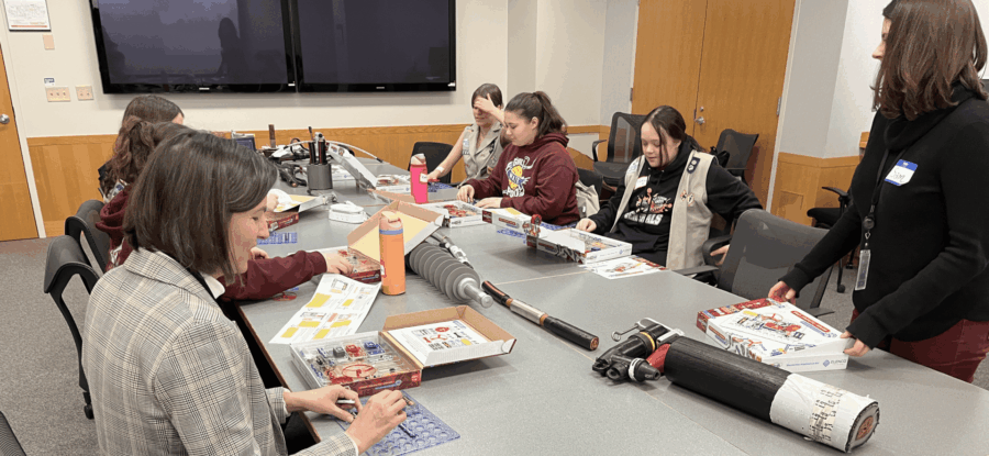 Girl Scouts and TPU electrical engineers at Steps to STEM April 2025