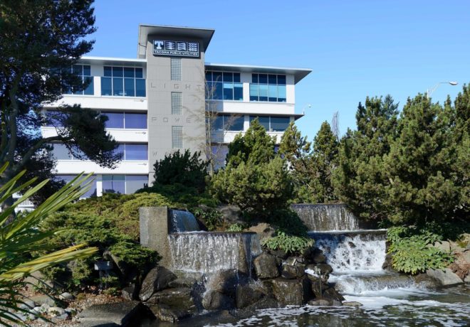 Tacoma Public Utilities main campus with water feature in the foreground.